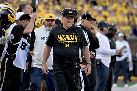Kyle Whittingham and Michigan Team