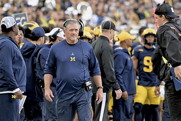 Kyle Whittingham and Michigan Team