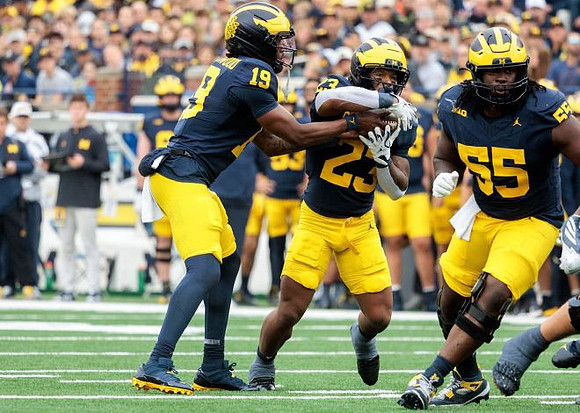 Bryce Underwood (19), Jordan Marshall (23), and Nathan Efobi (55)