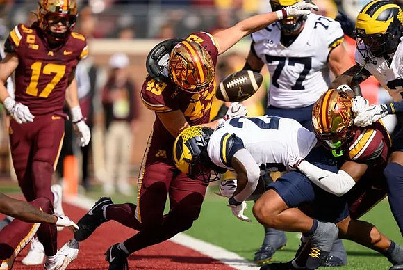 Blake Frazier (77) and Jordan Marshall (23)