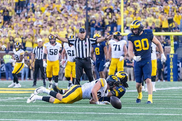 Dom Nichols (8), Troy Bowles (18), and John Henry Daley (90)