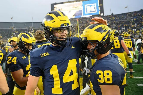 Bryson Kuzdzal (24), Tommy Carr (14), and Bryce Wilcox (38)