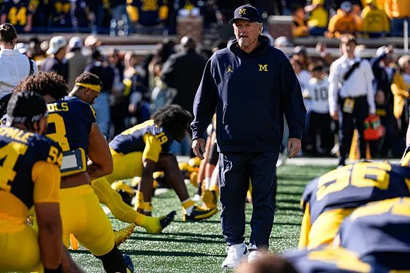 Kyle Whittingham and Michigan Team