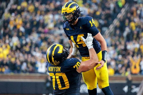 Brady Norton (70) and Tommy Carr (14)