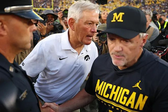 Iowa Head Coach Kirk Ferentz and Kyle Whittingham
