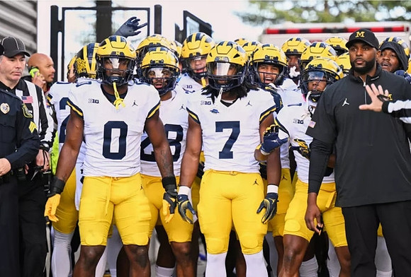 Sherrone Moore and Michigan Team