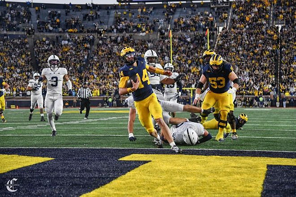 Tommy Carr (14) and Jake Guarnera (53)