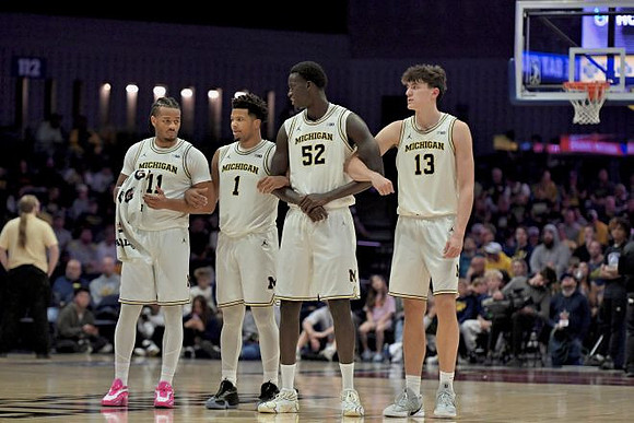 Roddy Gayle Jr. (11), Trey McKenney (1), Moustapha Thiam (52), and J.P. Estrella (13)