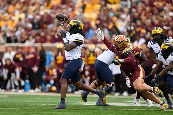 Bryce Underwood (19), Nathan Efobi (55), and Andrew Marsh (3)