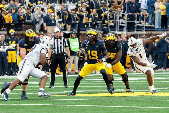 Bryce Underwood (19) and Nathan Efobi (55)