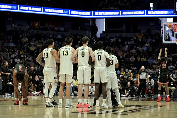 Jalen Reed (19), J.P. Estrella (13), Quinn Costello (8), Ricky Liburd (0), and Elliot Cadeau (3)