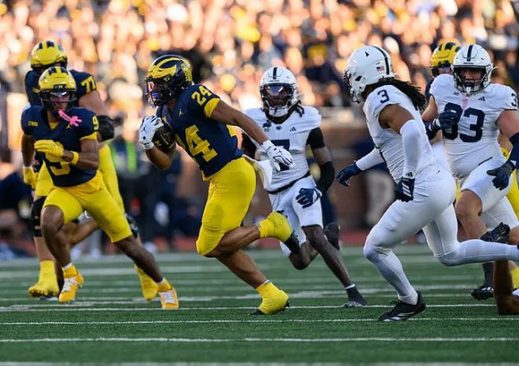 Blake Frazier (77), Channing Goodwin (9), and Bryson Kuzdzal (24)