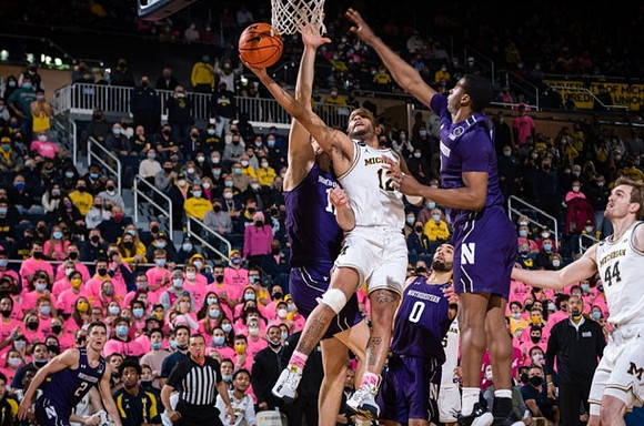 DeVante' Jones (12) and Jaron Faulds (44)