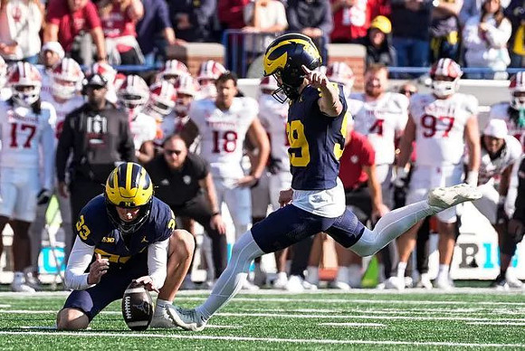 Cam Brown (33) and Trey Butkowski (99)