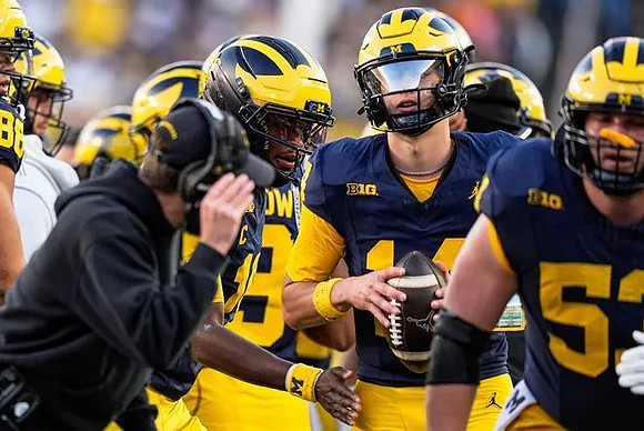 Tommy Carr (14) and Jake Guarnera (53)