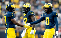 Chris Bracy (7), Nathaniel Owusu-Boateng (12), and Jyaire Hill (0)