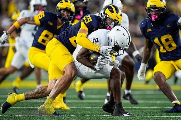 Mason Curtis (25), Logan Forbes (85), and Troy Bowles (18)