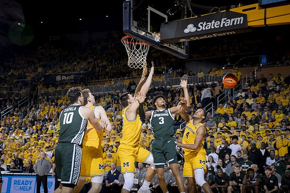 Danny Wolf (1), Vladislav Goldin (50), and Nimari Burnett (4)