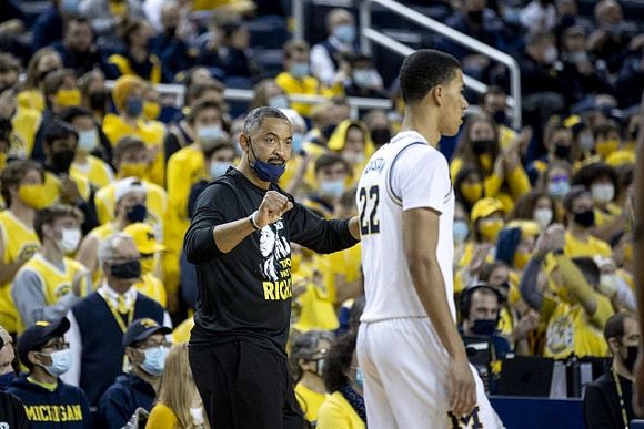 Juwan Howard and Caleb Houstan (22)