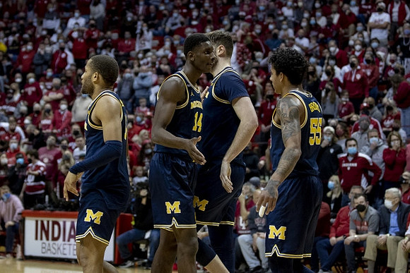 DeVante' Jones (12), Moussa Diabate (14), Hunter Dickinson (1), and Eli Brooks (55)