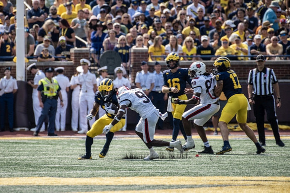 Donovan Edwards (7), Davis Warren (16), and Marlin Klein (17)