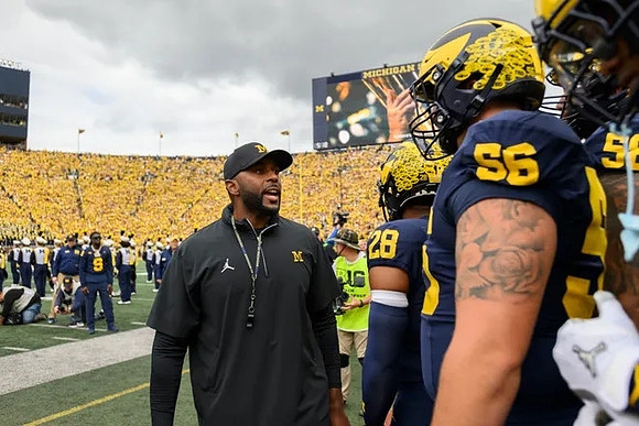 Sherrone Moore, Benjamin Hall (28), Dominick Giudice (56), and Giovanni El-Hadi (58)