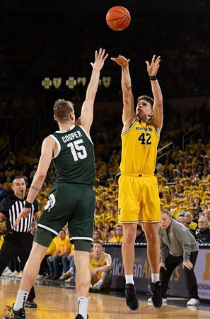 Will Tschetter (42) and Michigan State Head Coach Tom Izzo