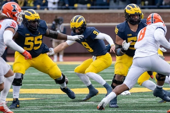 Olusegun Oluwatimi (55), J.J. McCarthy (9), and Giovanni El-Hadi (58)