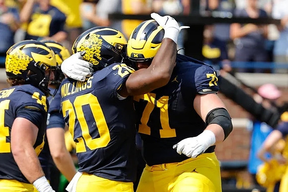 Max Bredeson (44), Kalel Mullings (20), and Evan Link (71)