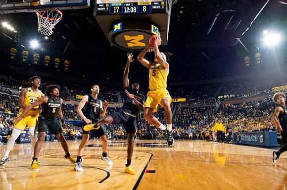 Tarris Reed Jr. (32) and Terrance Williams II (5)