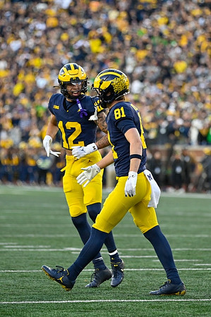 Kendrick Bell (12) and Peyton O'Leary (81)