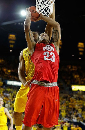 Jon Horford (15) and Nik Stauskas (11)
