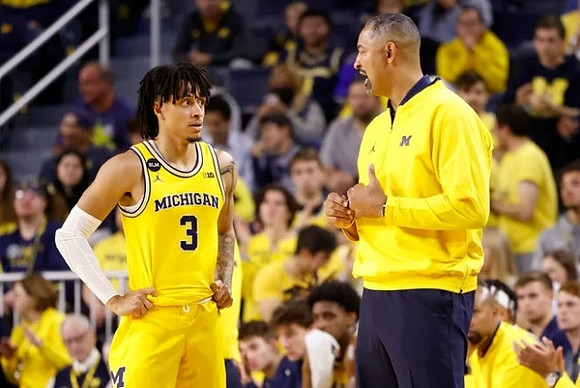 Jaelin Llewellyn (3) and Juwan Howard
