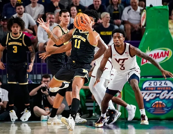 Tre Donaldson (3), Roddy Gayle Jr. (11), and Vladislav Goldin (50)