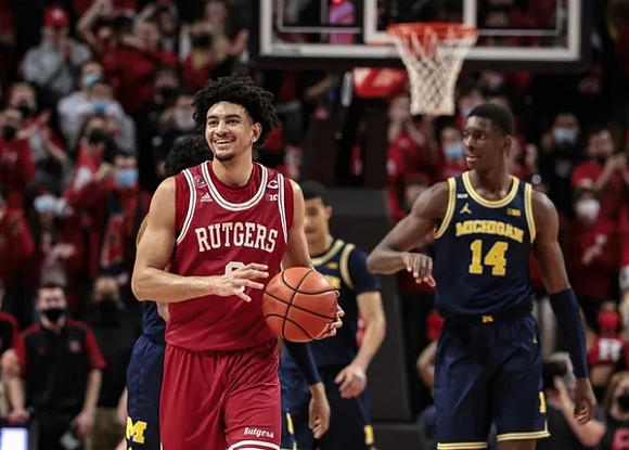 Caleb Houstan (22) and Moussa Diabate (14)