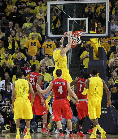 Trey Burke (3), Mitch McGary (4), and Glenn Robinson III (1)