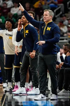 Dusty May and Michigan Team