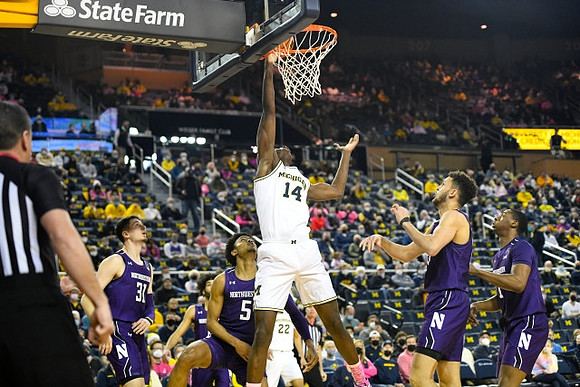 Moussa Diabate (14) and Caleb Houstan (22)