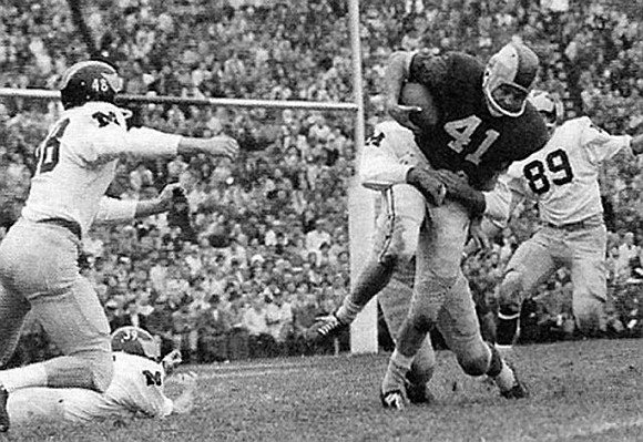 1960 Season-Ohio State: Reid Bushong (48), Kenneth Tureaud (39) and Robert Johnson (89)