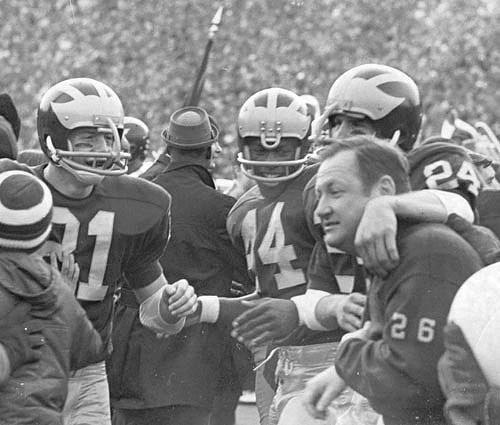 1969 Season-Ohio State: Bo Schembechler, Michael Hankwitz (81), Preston Henry (44), and Brian Healy (24)