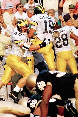 1994 Season-Notre Dame: Remy Hamilton (19), Jon Ritchie (40), and Deon Johnson (28)
