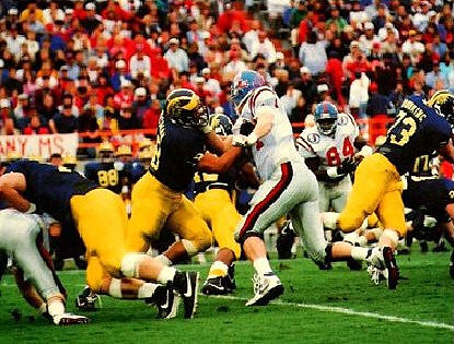 1990 Season-Mississippi: Tom Dohring (73), Dean Dingman (78), Elvis Grbac (15), and Greg Skrepenak (75)