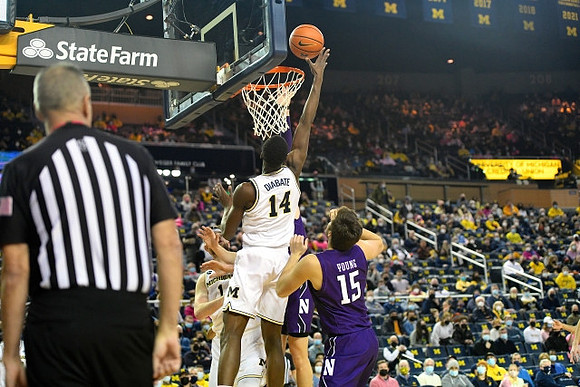 Moussa Diabate (14) and Hunter Dickinson (1)