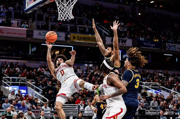 Roddy Gayle Jr. (11) and Tre Donaldson (3)