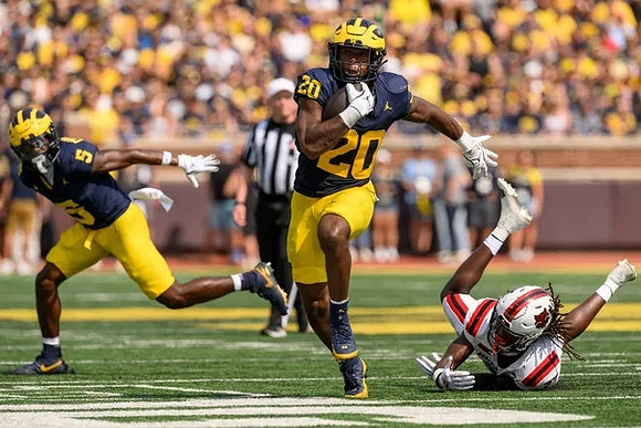 C.J. Charleston (5) and Kalel Mullings (20)
