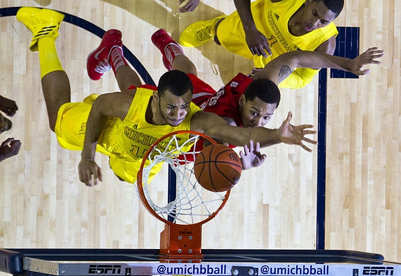 Jon Horford (15) and Glenn Robinson III (1)