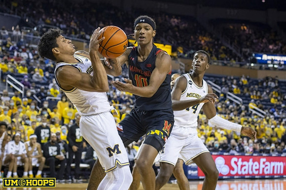 Eli Brooks (55) and Moussa Diabate (14)