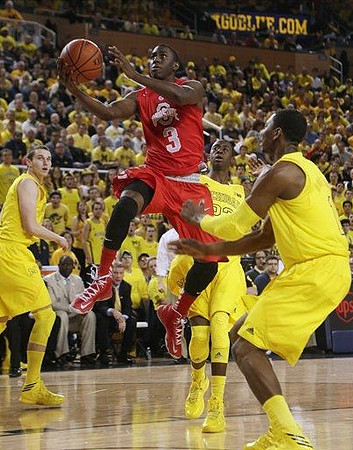 Nik Stauskas (11), Caris LeVert (23), and Glenn Robinson III (1)