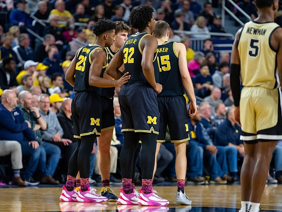 Youssef Khayat (24), Will Tschetter (42), Tarris Reed Jr. (32), and Joey Baker (15)