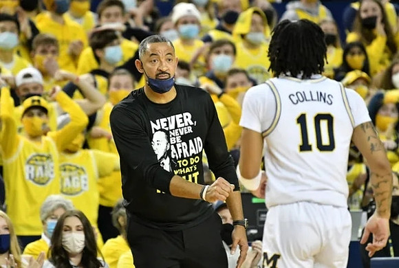 Juwan Howard and Frankie Collins (10)